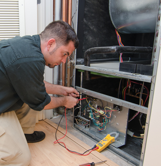 Contractor Repairing Heater